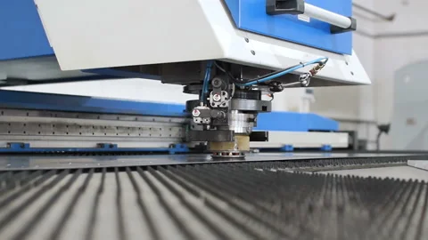 Head of perforating industrial machine. holes in the metal Stock Footage 88371009
