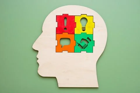 Head with puzzle about negotiations. Problem-solving and communication skills Stock Photos