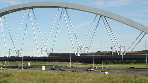 Head runner (koploper) train passing on the train bridge Stock Footage 112034786