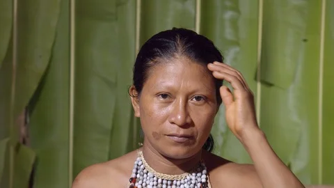 Head scratching by a woman like unable to solve a problem or in front of a Stock-Footage 113184378