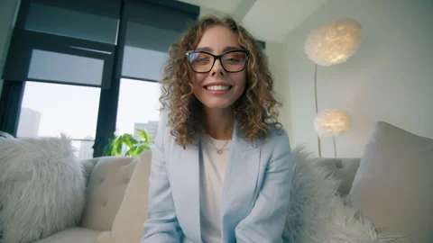 Head shot portrait young smart woman talk webcam participating videoconference Stockbeeldmateriaal 255347991