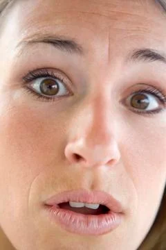 Head shot of surprised woman Stock Photos