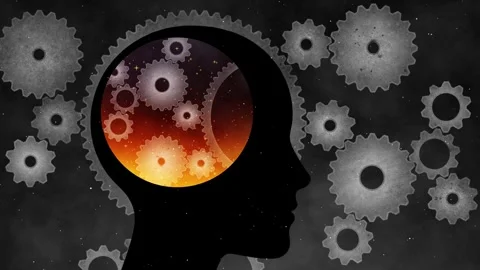 Head silhouette filled with internal glowing fire and rotating mechanical cogs Stock Footage 320668940
