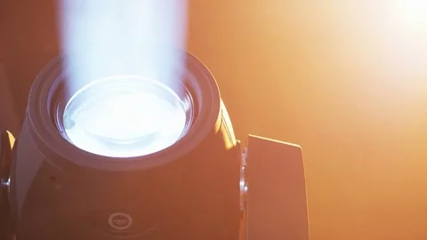 Head Spot Moving and Giving Light in Different Colors Stock Footage 71722740