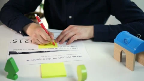 The head of the state body makes notes on the report of social orientation. Stock Footage 312169388