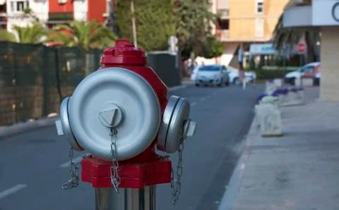 The head of the street fire hydrant in the background of the street Stock Photos