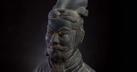 Head of terracotta warrior on black background Stock Footage 141909814