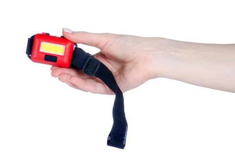 Head Torch flashlight in hand Stock Photos