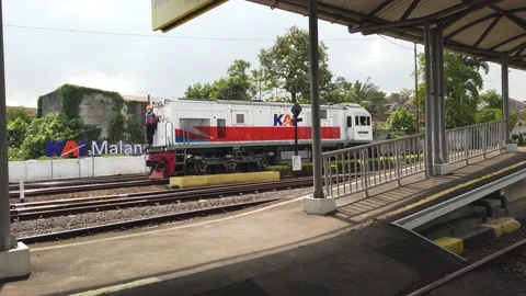  the head of the train locomotive prepares to leave the Kotalama station Stock Footage 199525367
