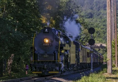 Head on View of a Double Header Steam Passenger Train, Blowing Smoke and Steam Stock Photos