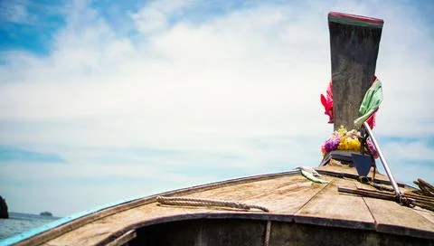 Head view of a long tail boat  looking out into the sea. A long-tailed speed  Stock Photos