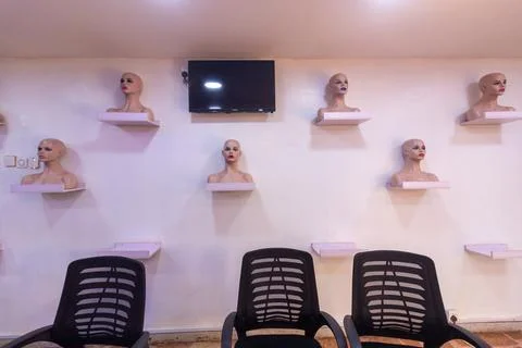 Head on view of spa display wall and chairs Stock Photos