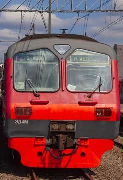 Head wagon of the ED4M electric train on the railway tracks on the station .. Stock Photos