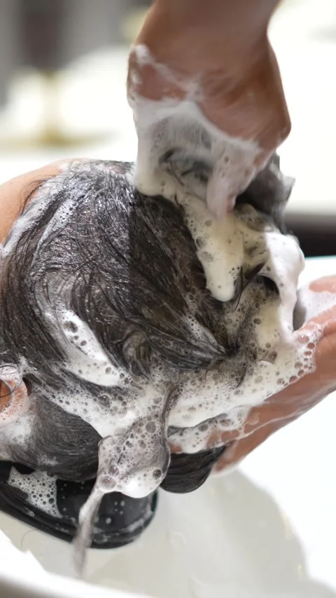 Head Wash at Shampoo Station Stock Footage 325528785