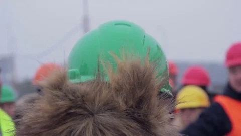 Head in work helmet and fox fur at plant Stock Footage 70939711
