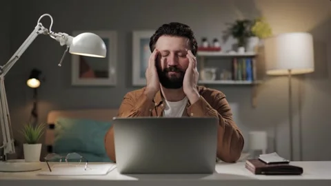 Headache, eye fatigue. Overworked computer user touches tired eyes. Exhausted Видео 196201722