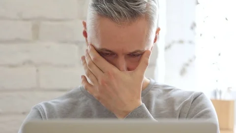 Headache, Frustrated Middle Aged Man at Work, Front View Video stock 75299664