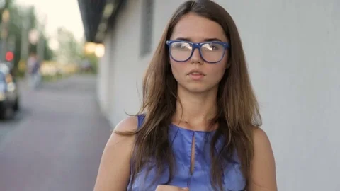 Headache in a girl on the street Stock Footage 77299853