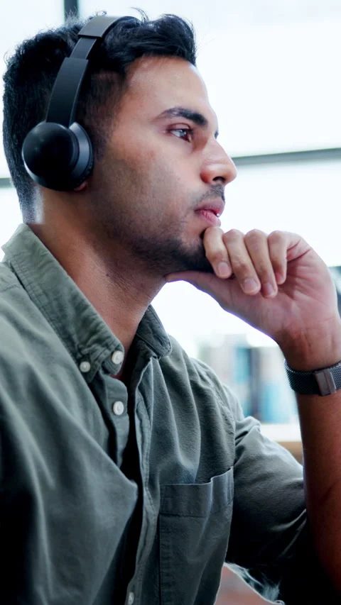 Headache, headset and thinking with man in call center for assistance Stock Footage 340452390