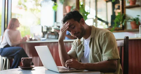 Headache, laptop and remote work with man in coffee shop for error, mistake or Stock Footage 330998837
