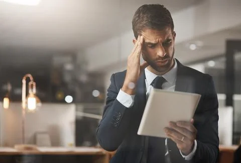 Headache, man or tablet in office for finance, company error and tired in Foto stock
