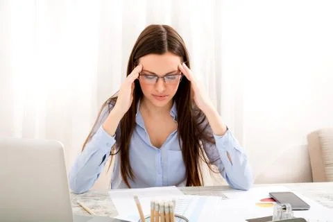 Headache meanwhile working Stock Photos