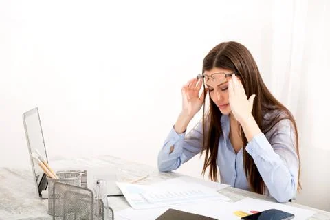 Headache meanwhile working Stock Photos