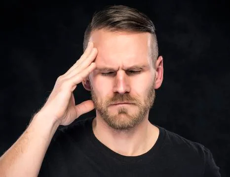 Headache in men. Stock Photos