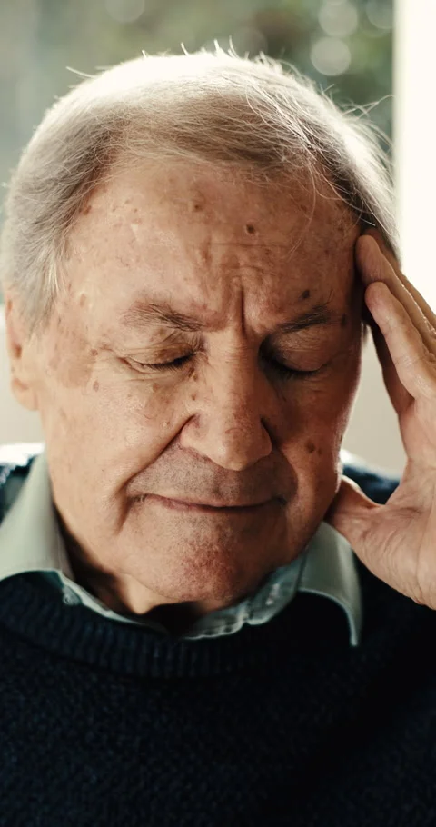 Headache, pain and elderly man in home with fatigue, high blood pressure or Stock Footage 342238811