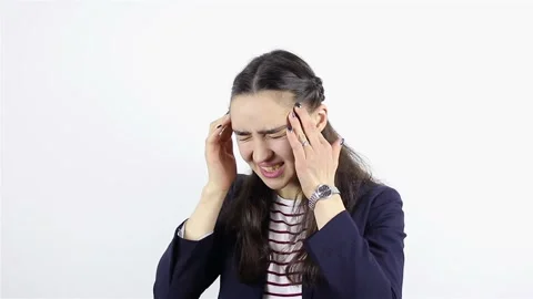 Headache, Stressful Work Overload for a young beautiful woman Stock Footage 87936878