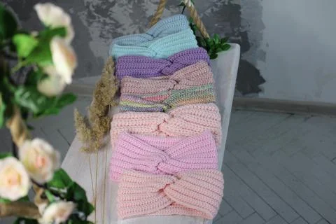 Headbands crocheted knitted in the interior, product listing for sale Stock Photos