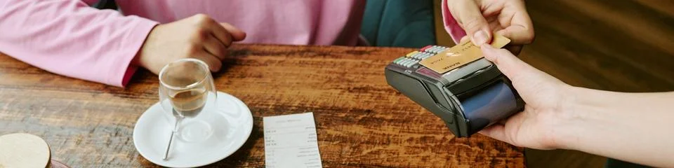 Header of Customer Making Contactless Payment with Credit Card in Cafe Stock Photos