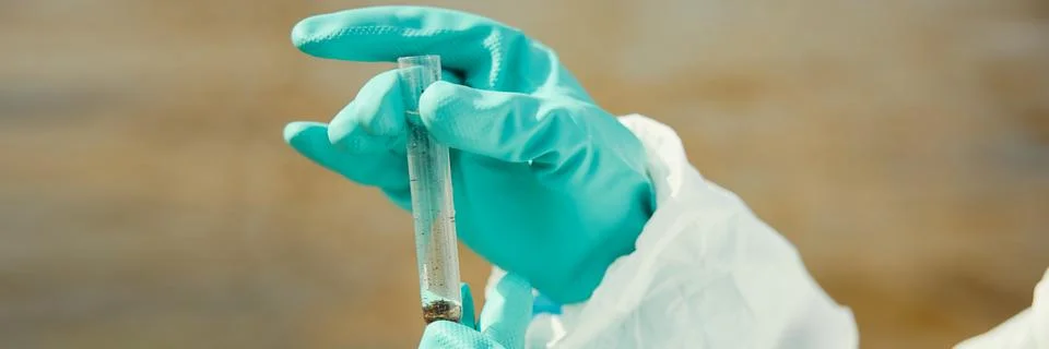 Header of Scientist Holding Water Sample Tube for Environmental Analysis Stock Photos