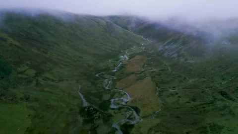 Heading up hill over stream with heavy fog Brampton Cumbria Video stock 326969022