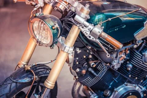 Headlamp of a chopper. In front of chrome elements and chrome engine Stock Photos