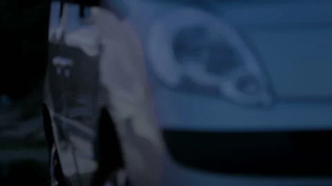 Headlamp turning on during car presentation, transport technology, parking Stock Footage 87230499