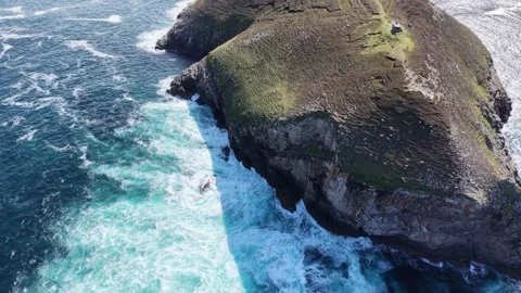 Headland Eire 63 Sign surrounded by Atlantic ocean in Portacloy, Ireland. Stock Footage 342665723