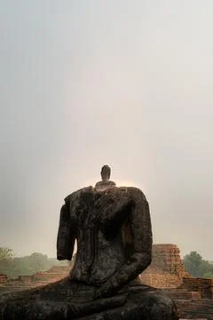 The headless ancient Buddha statue Stock Photos