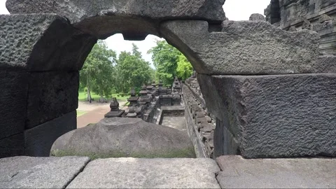 Headless Buddha Statue, Arch on the Terrace, Borobudur Temple, Java, Indonesia Stock Footage 242179640