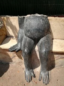 Headless Fat Monkey Statue In Zoo Stock Photos