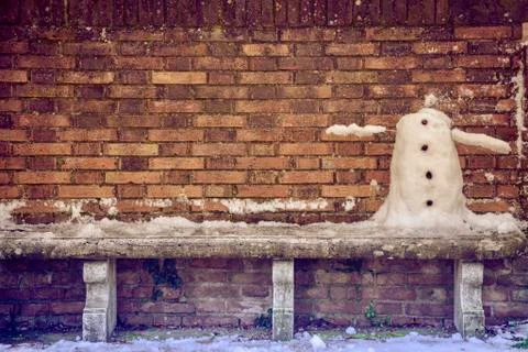 Headless snowman on bench Stock Photos