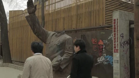 Headless Statue With Bicycle and Graffiti in 798 Art District Beijing Street Sce Stock Footage 341715653
