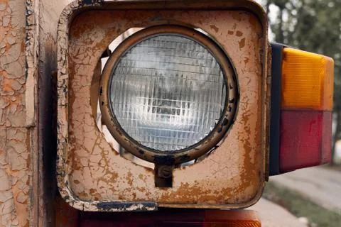 Headlight and close view of old tractor parts Stock Photos