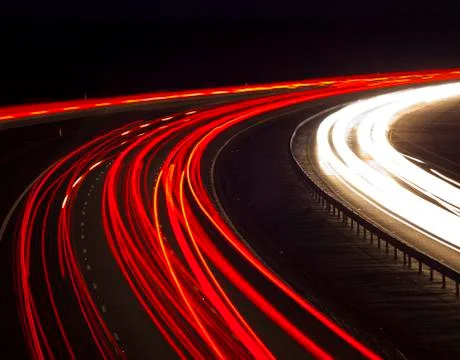 Headlight and tail light trails at night Stock Photos