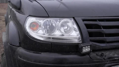 Headlight of a black car close-up. Stock Footage 268173054