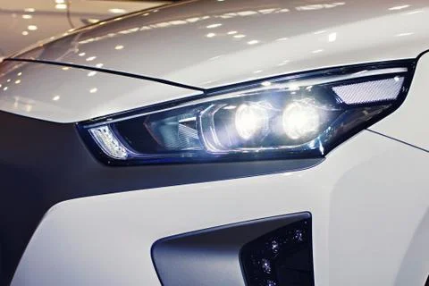 The headlight of the car is close-up Stock Photos