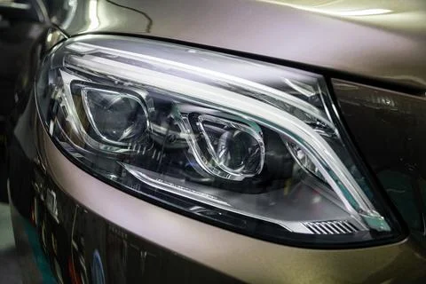 Headlight of a car, close up Stock Photos