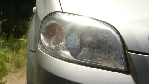 The headlight of the car flashes on the right side. Stock Footage 134120389