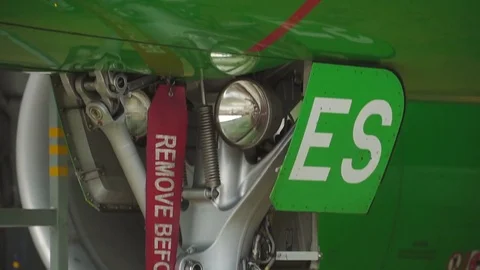 The headlight on the front of the plane Stock Footage 84406551