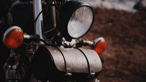 Headlight of motorcycle above attached leather tool bag Video stock 170194827